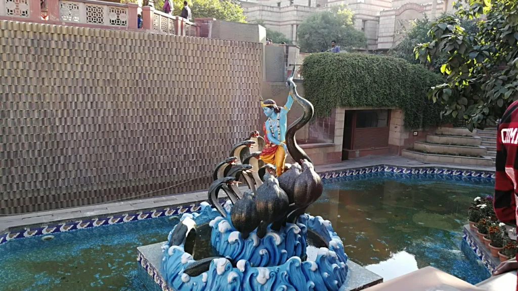 Lord krishna's fight with Sheshnaag sculpture 