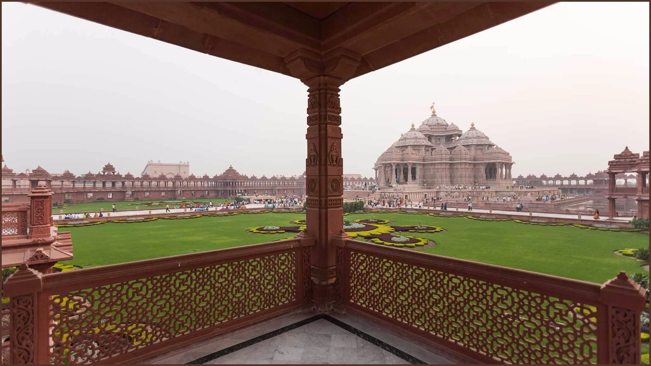 There is a big garden and many structures surrounding the temple. 