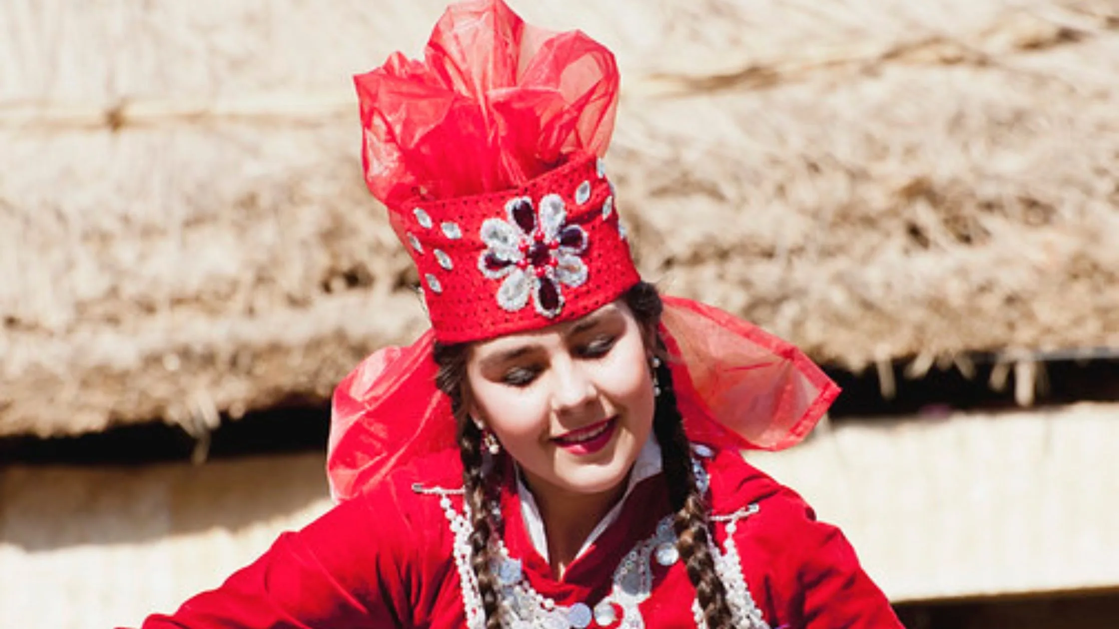 A girl doing folk dance in her native dress. 