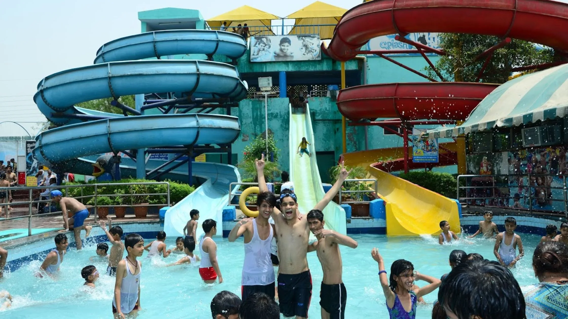 People dancing in the water park