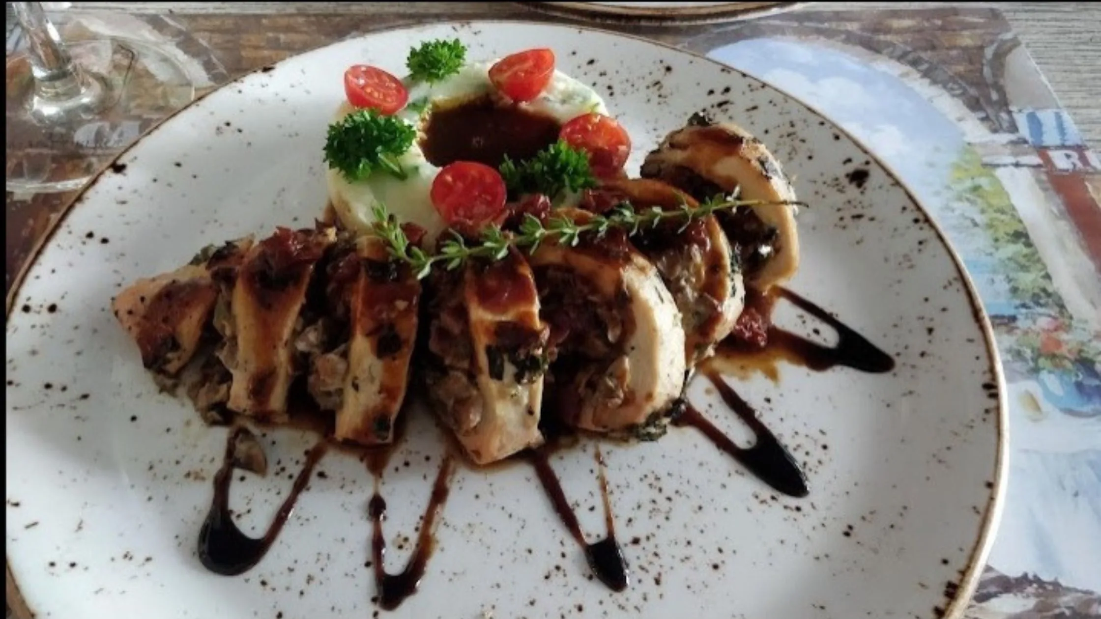 A dish served in a white plate at Cafe Delhi Heights.