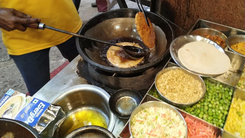 A guy making parathas at Paranthe wali Gali