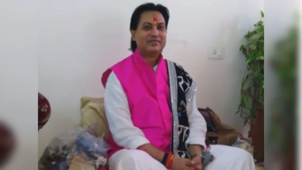 Acharya Rajesh Krishna wearing white colored clothes 